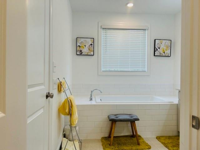 5236 Riden Court Buford, GA 30518 - Photo 32 of 41 a bathroom with a sink and a bathtub