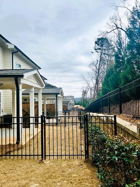 5236 Riden Court Buford, GA 30518 - Photo 35 of 41 a view of a house with backyard and deck