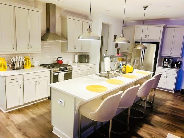 5236 Riden Court Buford, GA 30518 - Photo 9 of 41 a kitchen with a stove a white table and chairs