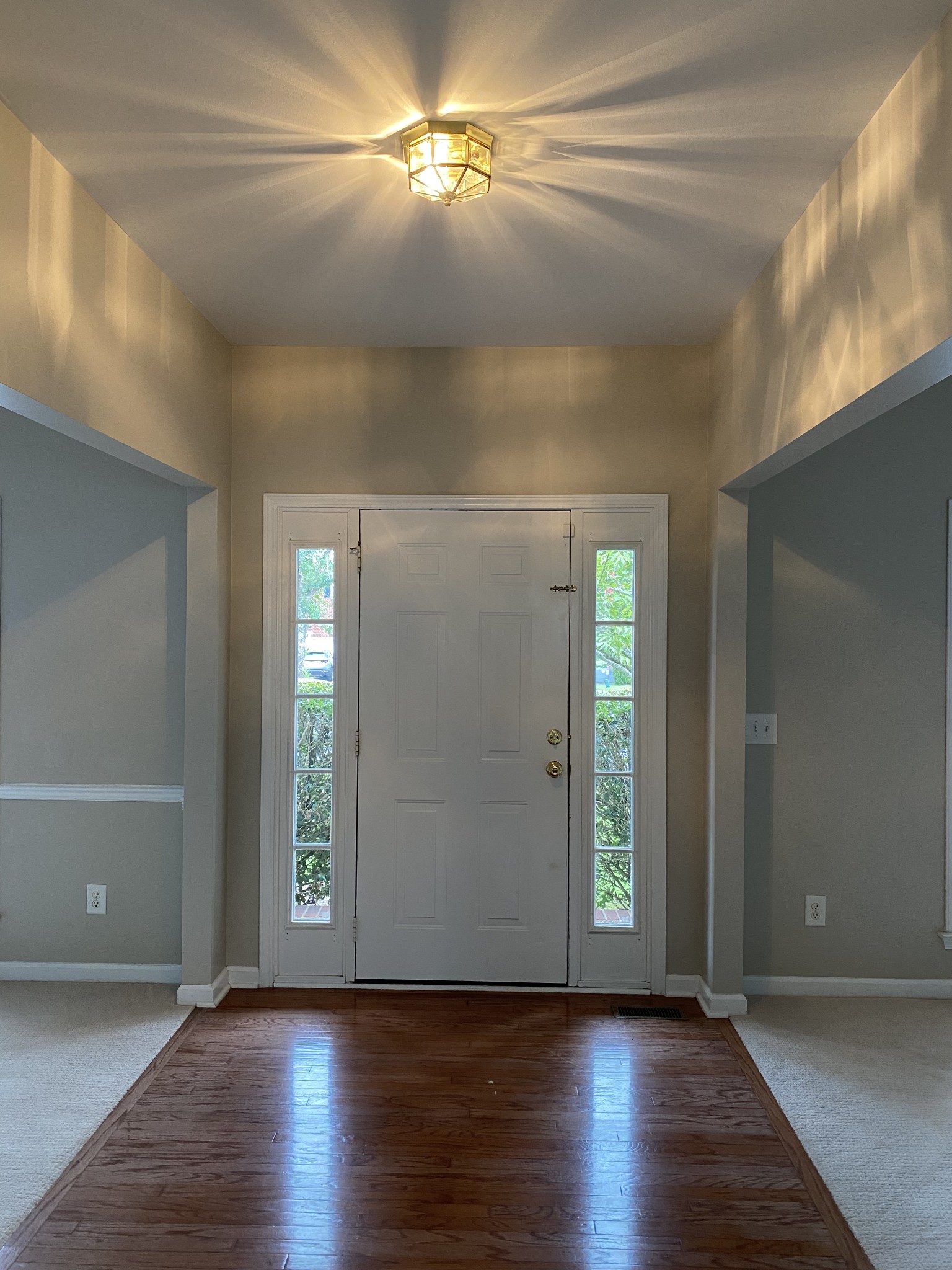 1302 Fenner Court Franklin, TN 37067 - Photo 3 of 26 an empty room with wooden floor and windows