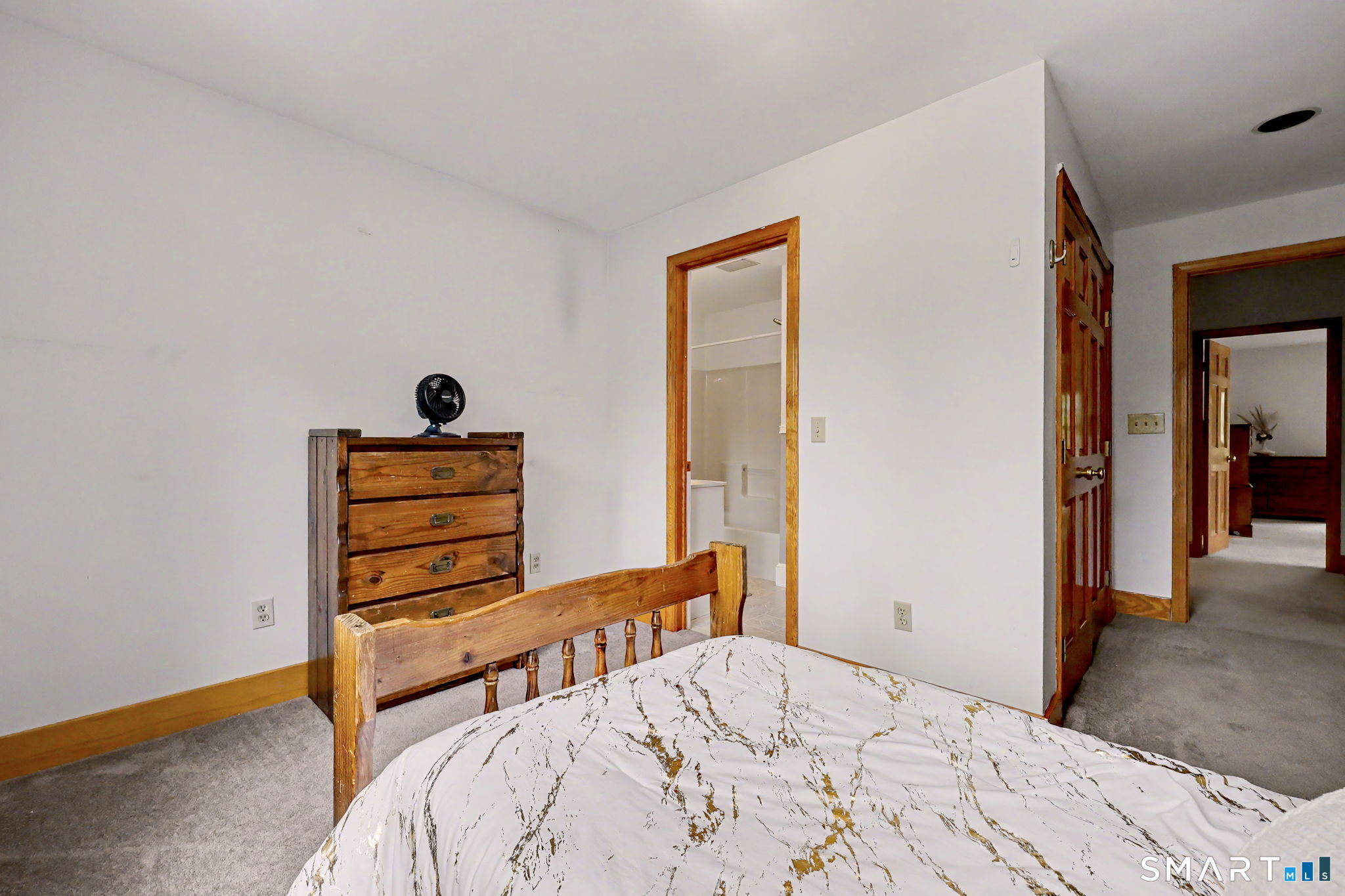 7 Merrill Road Trumbull, CT 06611 - Photo 30 of 40 a bedroom with furniture and a bed