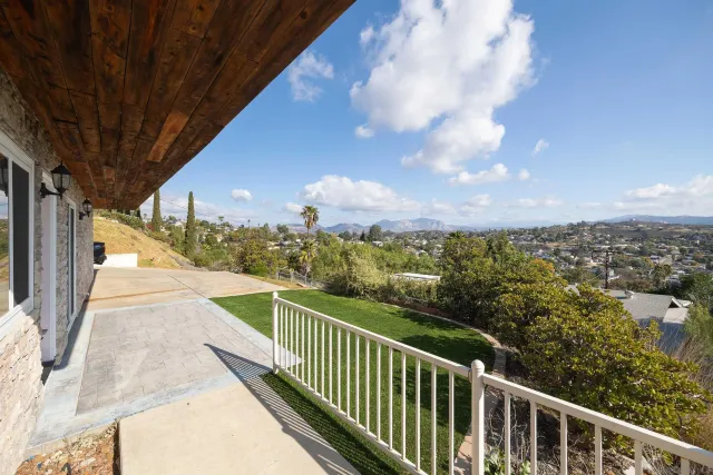 a view of a balcony with an outdoor space