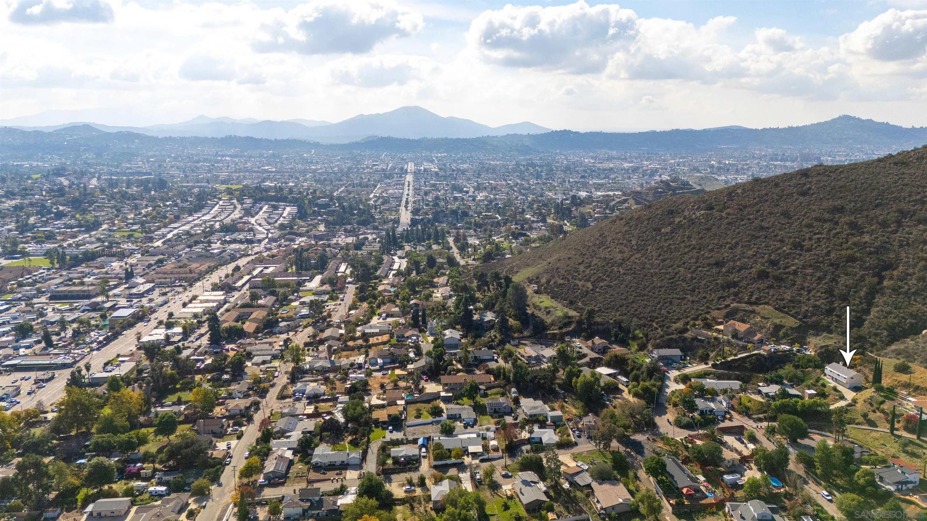 11817 Altadena Road Lakeside, CA 92040 - Photo 4 of 7 an aerial view of house with yard and mountain view in back