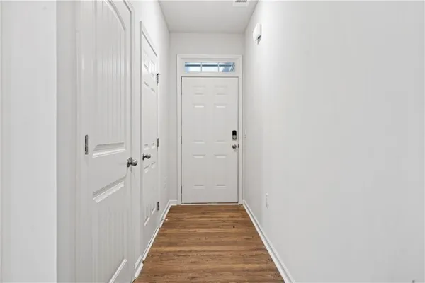 a view of a bathroom from the hallway