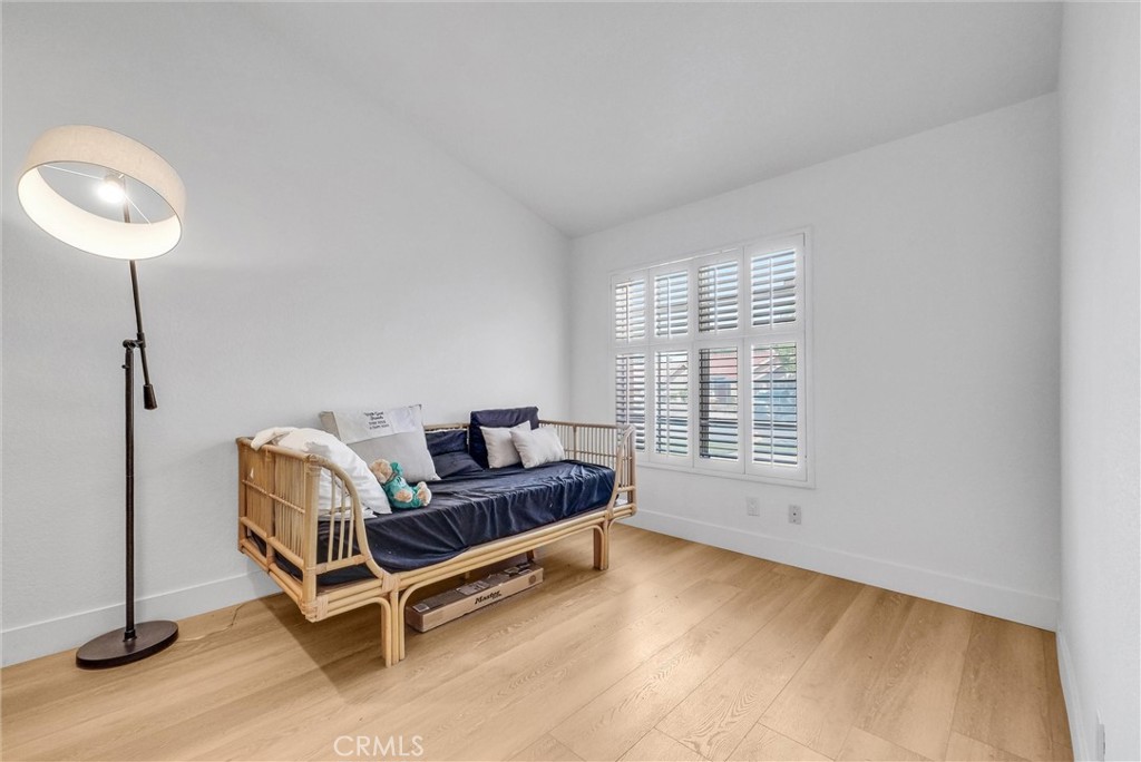 24461 Willow Run Road Moreno Valley, CA 92557 - Photo 18 of 24 a living room with furniture and a window