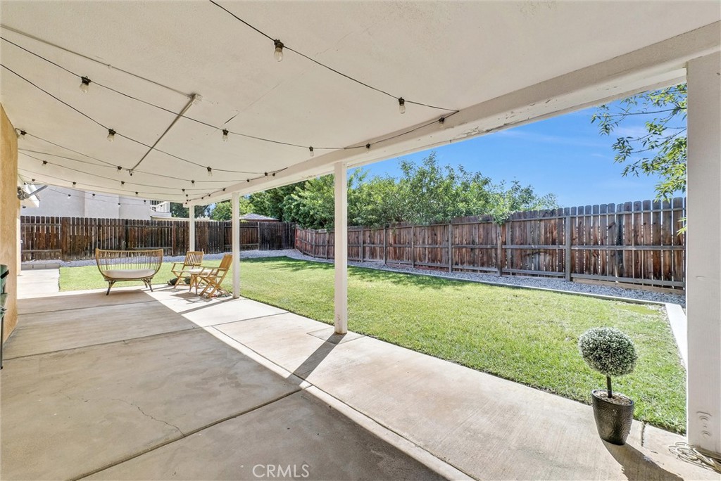 24461 Willow Run Road Moreno Valley, CA 92557 - Photo 19 of 24 a view of a backyard with swimming pool