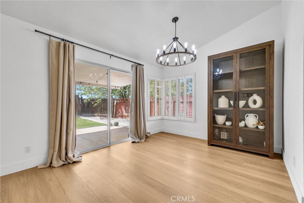 24461 Willow Run Road Moreno Valley, CA 92557 - Photo 5 of 24 a view of an empty room with a window