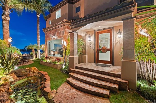 front view of a house with a small yard