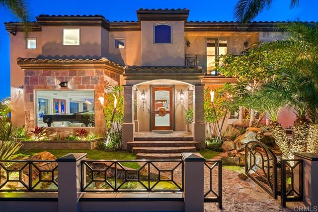 a view of a patio with table and chairs and potted plants