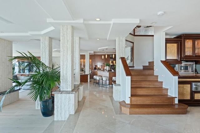 a large bathroom with a large tub and sink