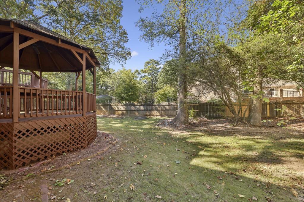 4972 Vermack Road Atlanta, GA 30338 - Photo 20 of 46 a view of backyard with small cabin