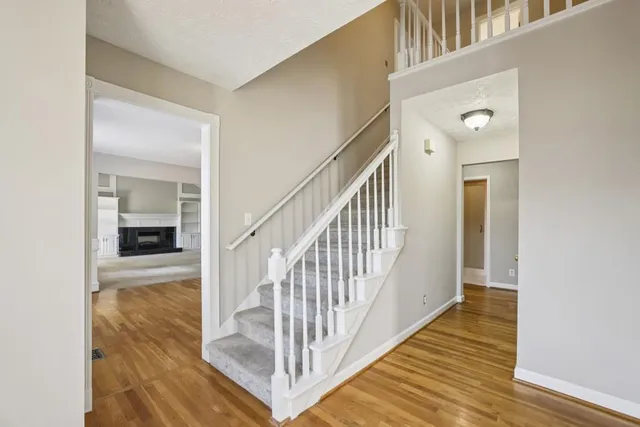 a view of a hallway view with staircase