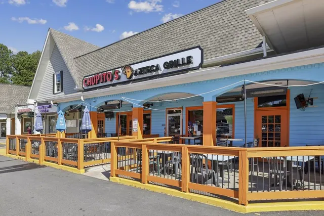 a view of a building with glass windows