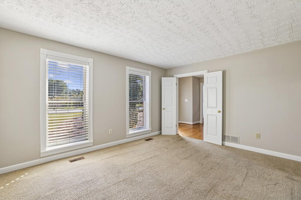 4972 Vermack Road Atlanta, GA 30338 - Photo 3 of 46 a view of an empty room with a window