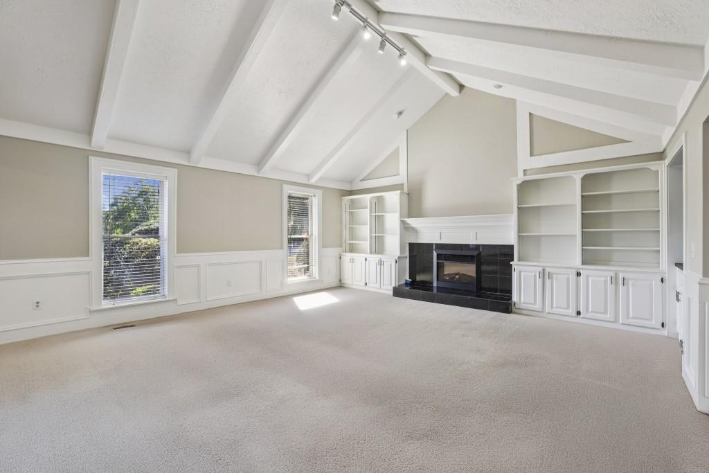 4972 Vermack Road Atlanta, GA 30338 - Photo 5 of 46 a view of a livingroom with an empty space and a fireplace