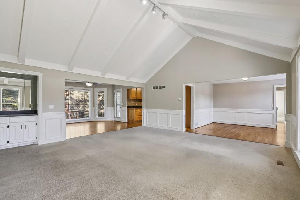 4972 Vermack Road Atlanta, GA 30338 - Photo 6 of 46 a view of an empty room with a fireplace and a window
