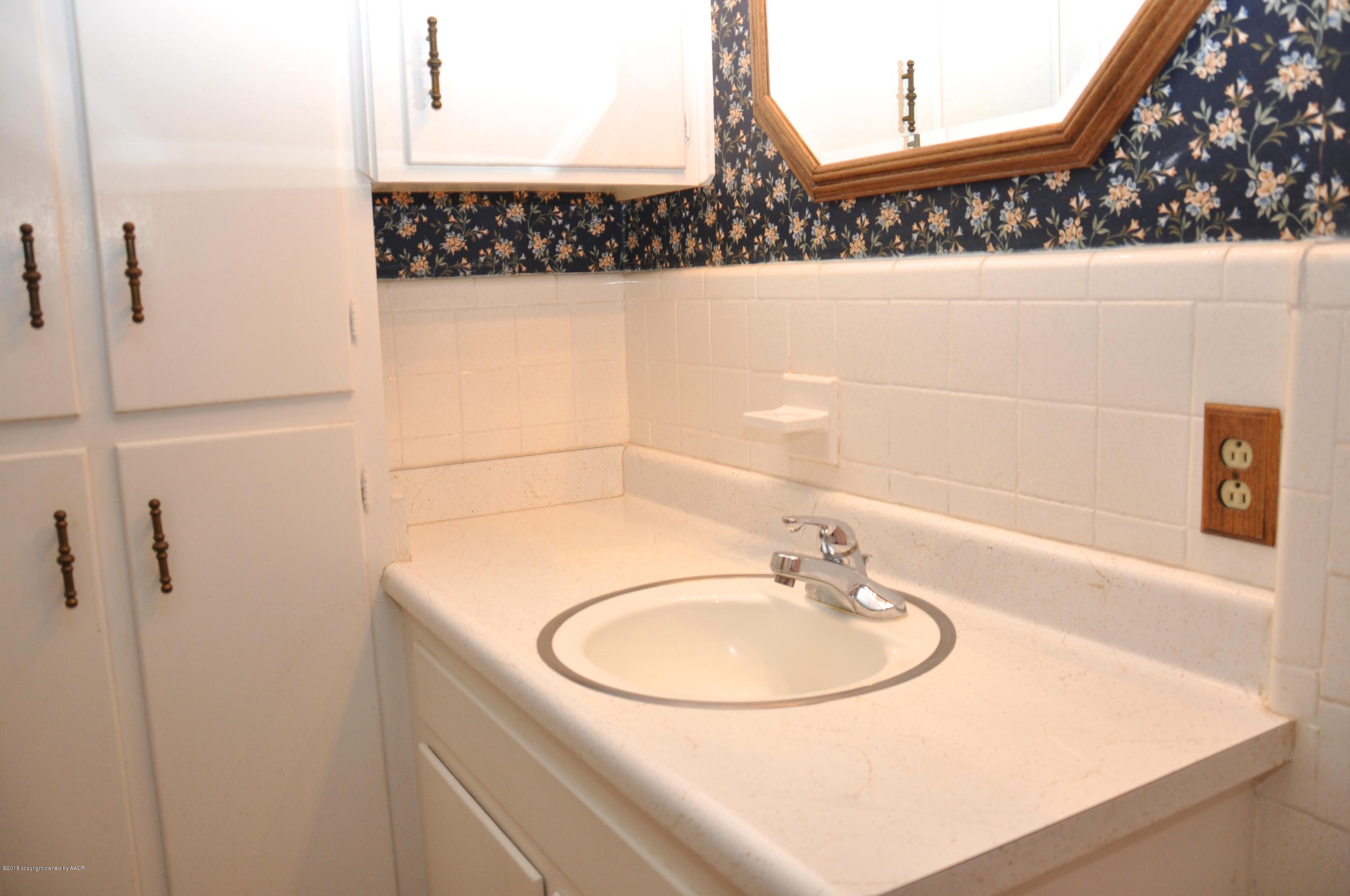 5100 Kirk Drive Amarillo, TX 79110 - Photo 7 of 22 Bathroom sink