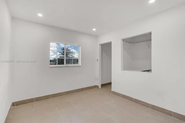 an empty room with windows