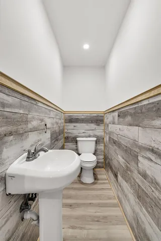 a bathroom with a sink and a toilet