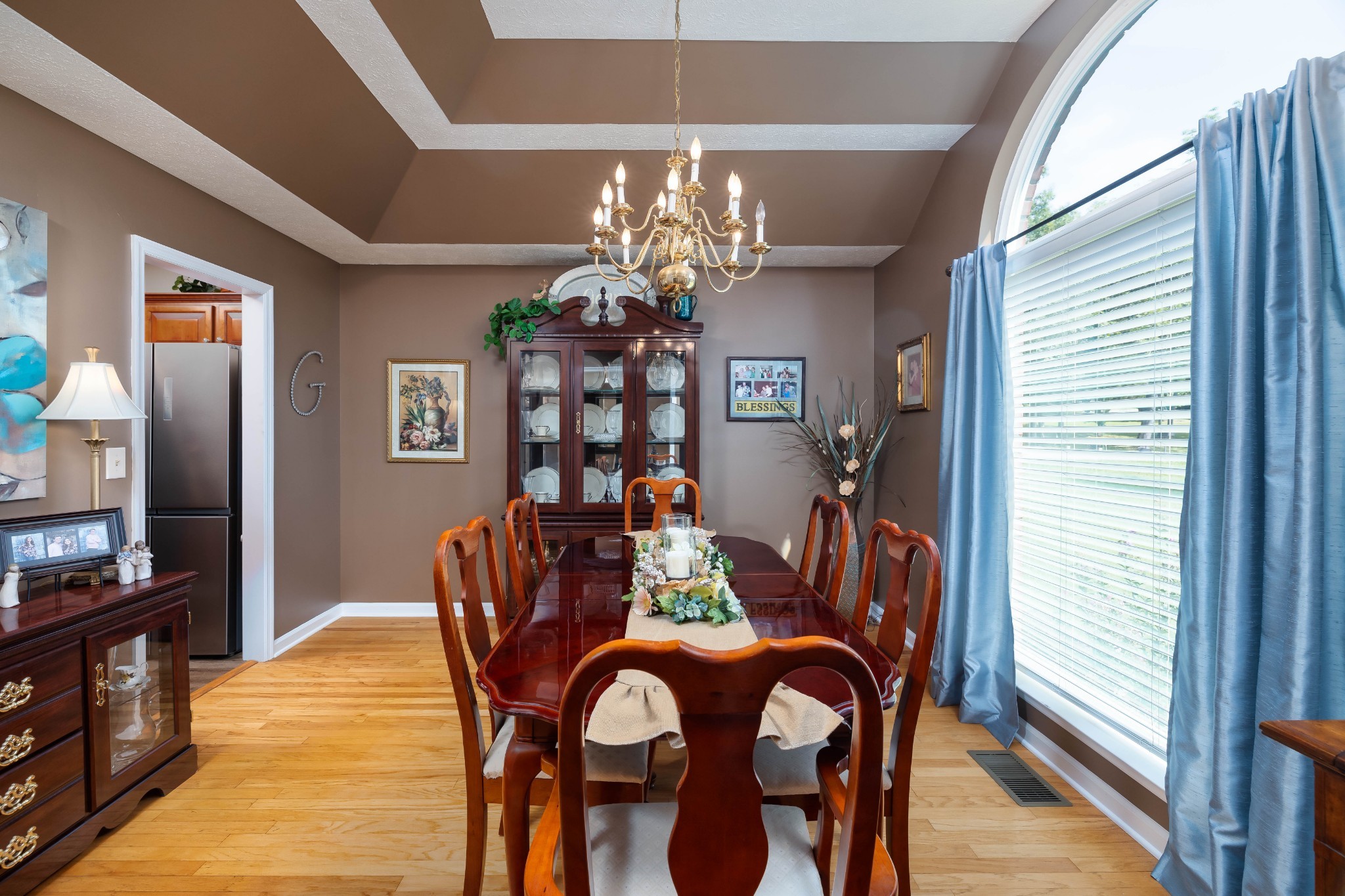 232 Trice Road Lebanon, TN 37087 - Photo 16 of 43 a view of a dining room with furniture and a chandelier