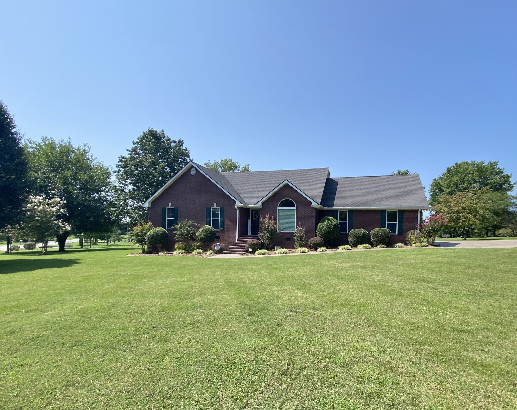 232 Trice Road Lebanon, TN 37087 - Photo 2 of 43 a front view of a house with a yard and garage