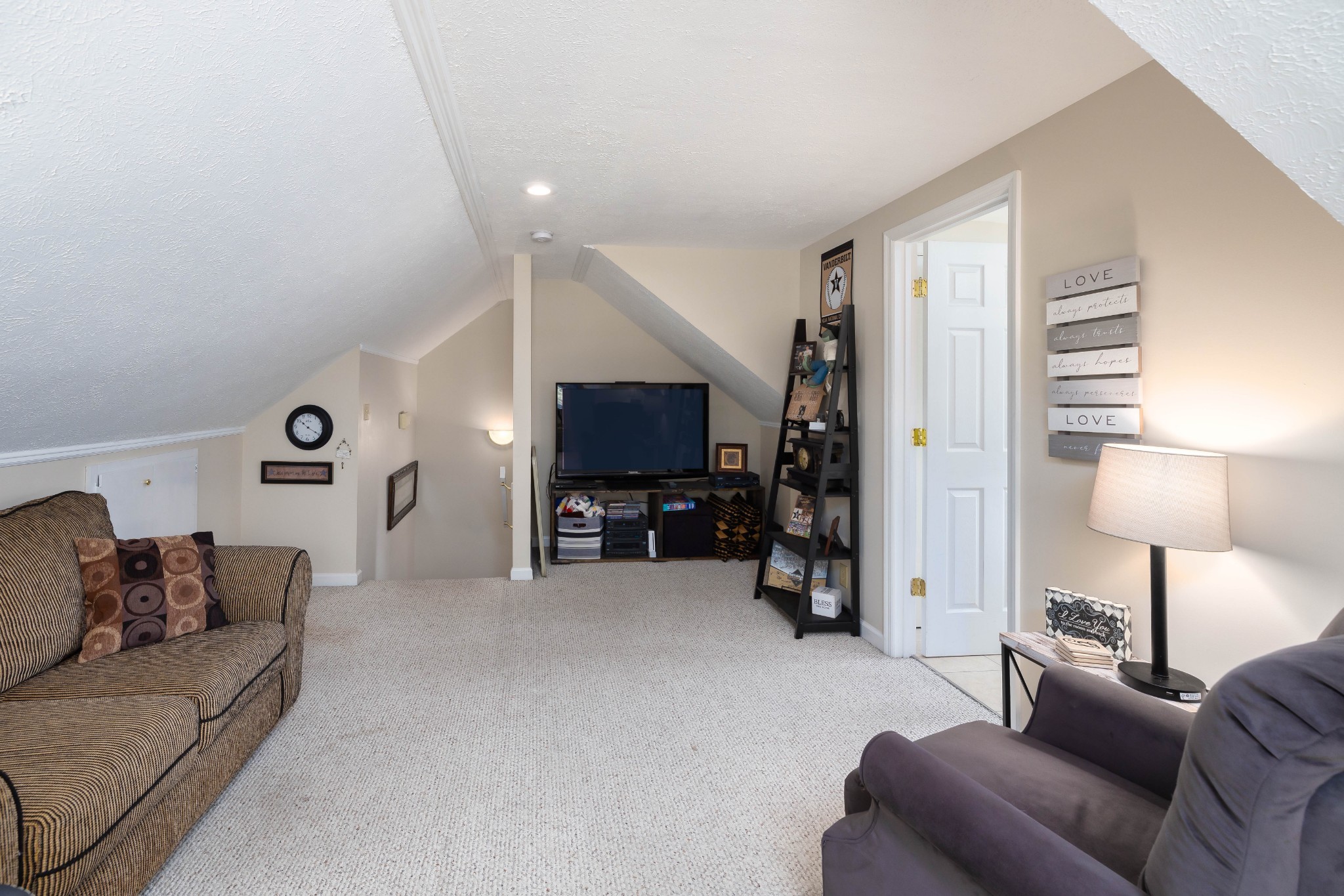 232 Trice Road Lebanon, TN 37087 - Photo 34 of 43 a living room with furniture and a flat screen tv