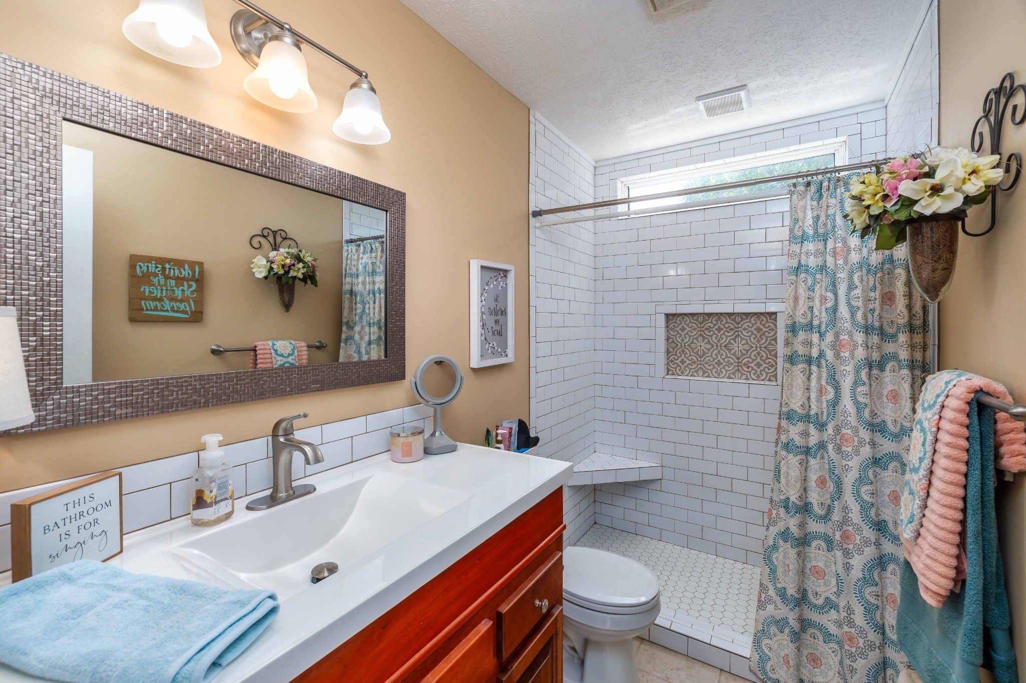 232 Trice Road Lebanon, TN 37087 - Photo 39 of 43 a bathroom with a sink mirror vanity and toilet