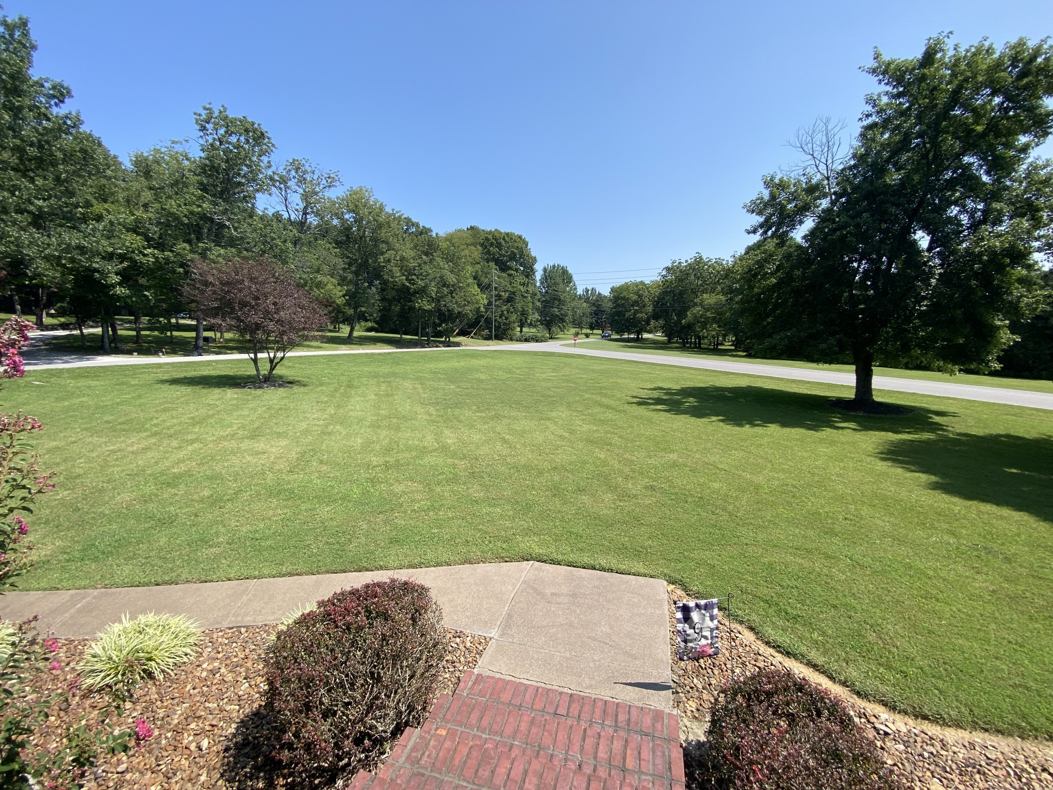 232 Trice Road Lebanon, TN 37087 - Photo 4 of 43 a view of a golf course with a lake