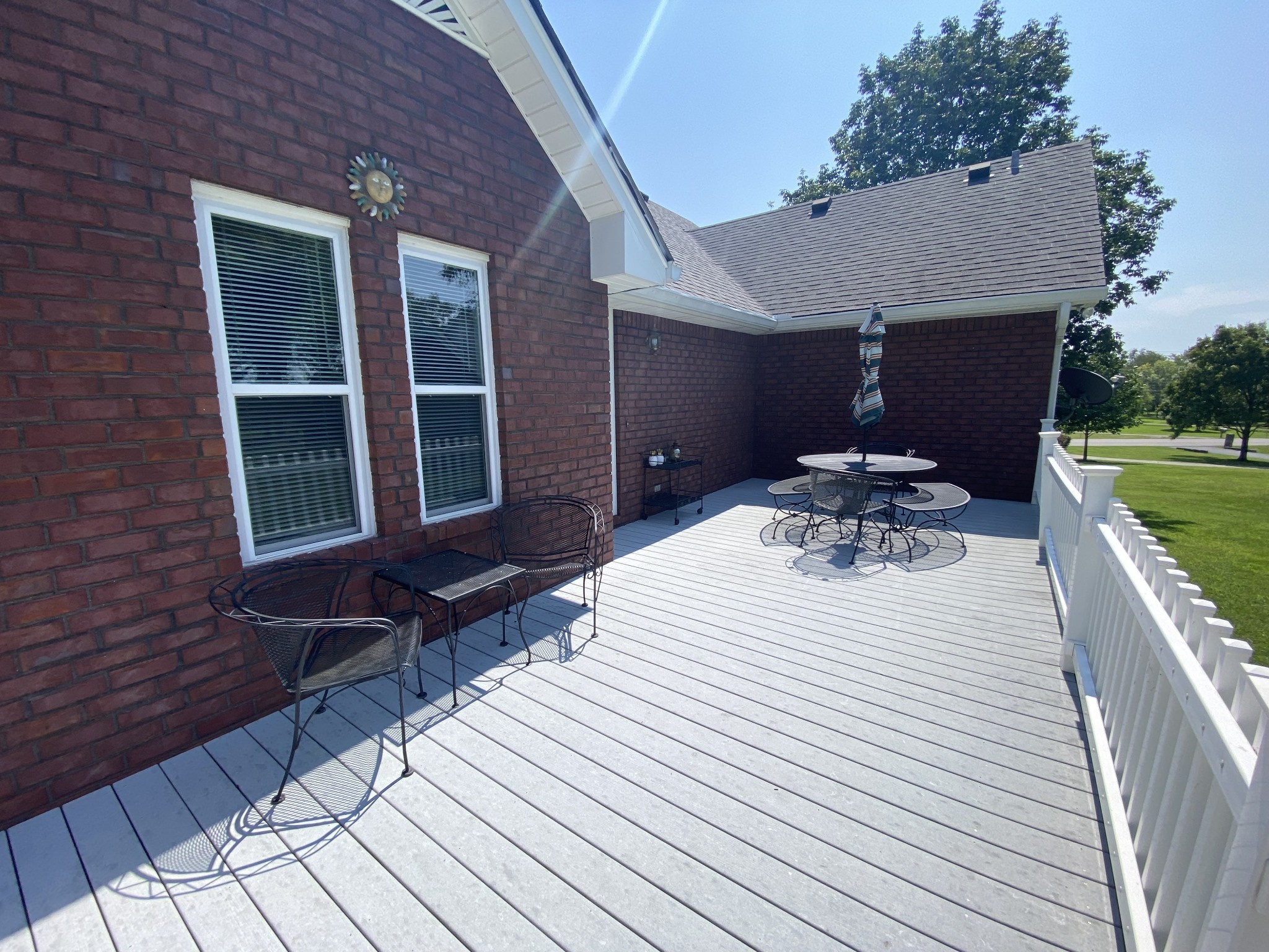 232 Trice Road Lebanon, TN 37087 - Photo 6 of 43 a view of a patio with table and chairs with wooden floor and fence