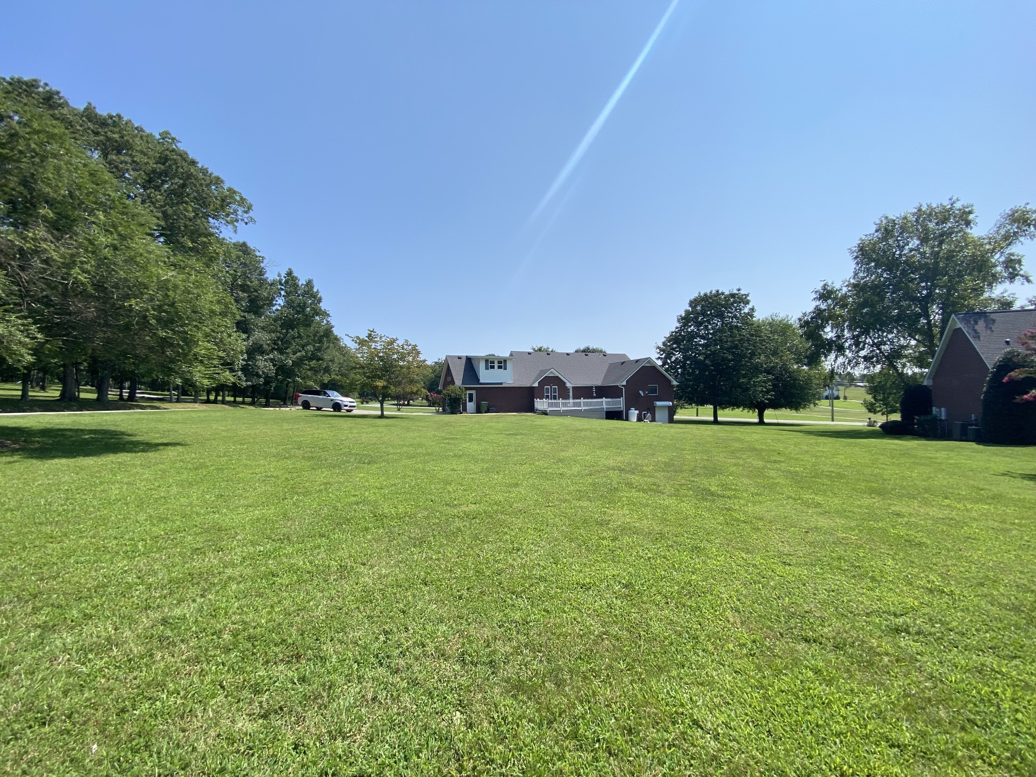 232 Trice Road Lebanon, TN 37087 - Photo 10 of 43 a view of a green field with wooden fence