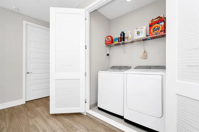 a utility room with dryer and washer