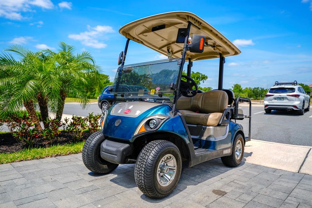 743 Driving Range Court Reunion, FL 34747 - Photo 2 of 38 a car parked in front of a house