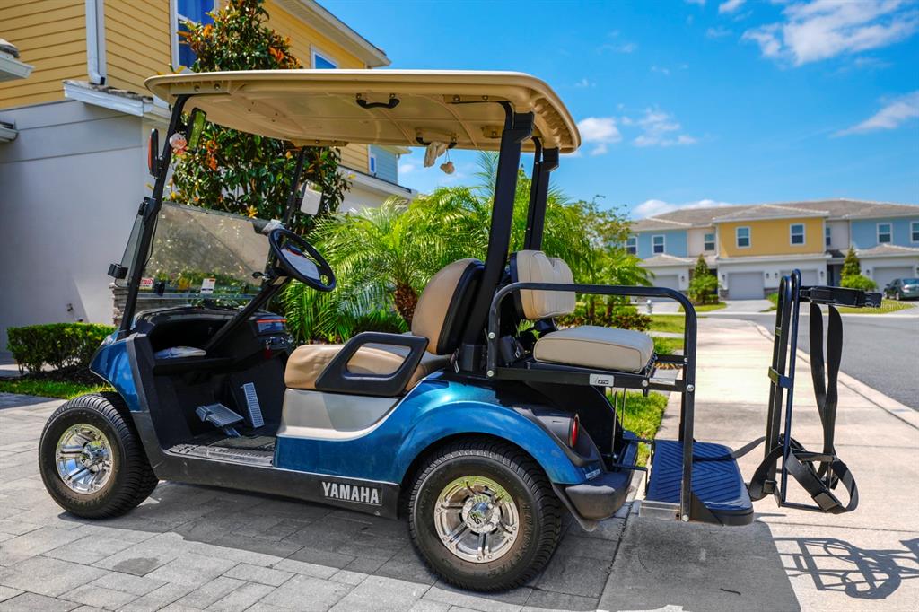 743 Driving Range Court Reunion, FL 34747 - Photo 21 of 38 a car parked in front of a house