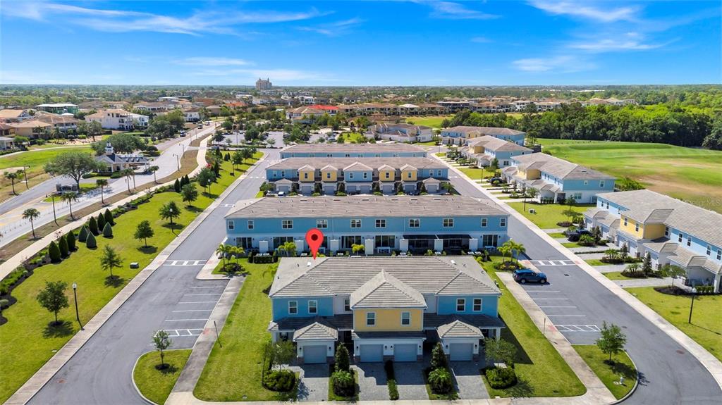 743 Driving Range Court Reunion, FL 34747 - Photo 25 of 38 an aerial view of residential houses with outdoor space