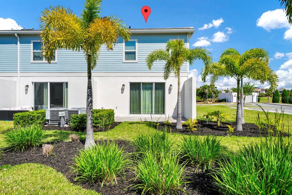 743 Driving Range Court Reunion, FL 34747 - Photo 3 of 38 a front view of a house with a yard