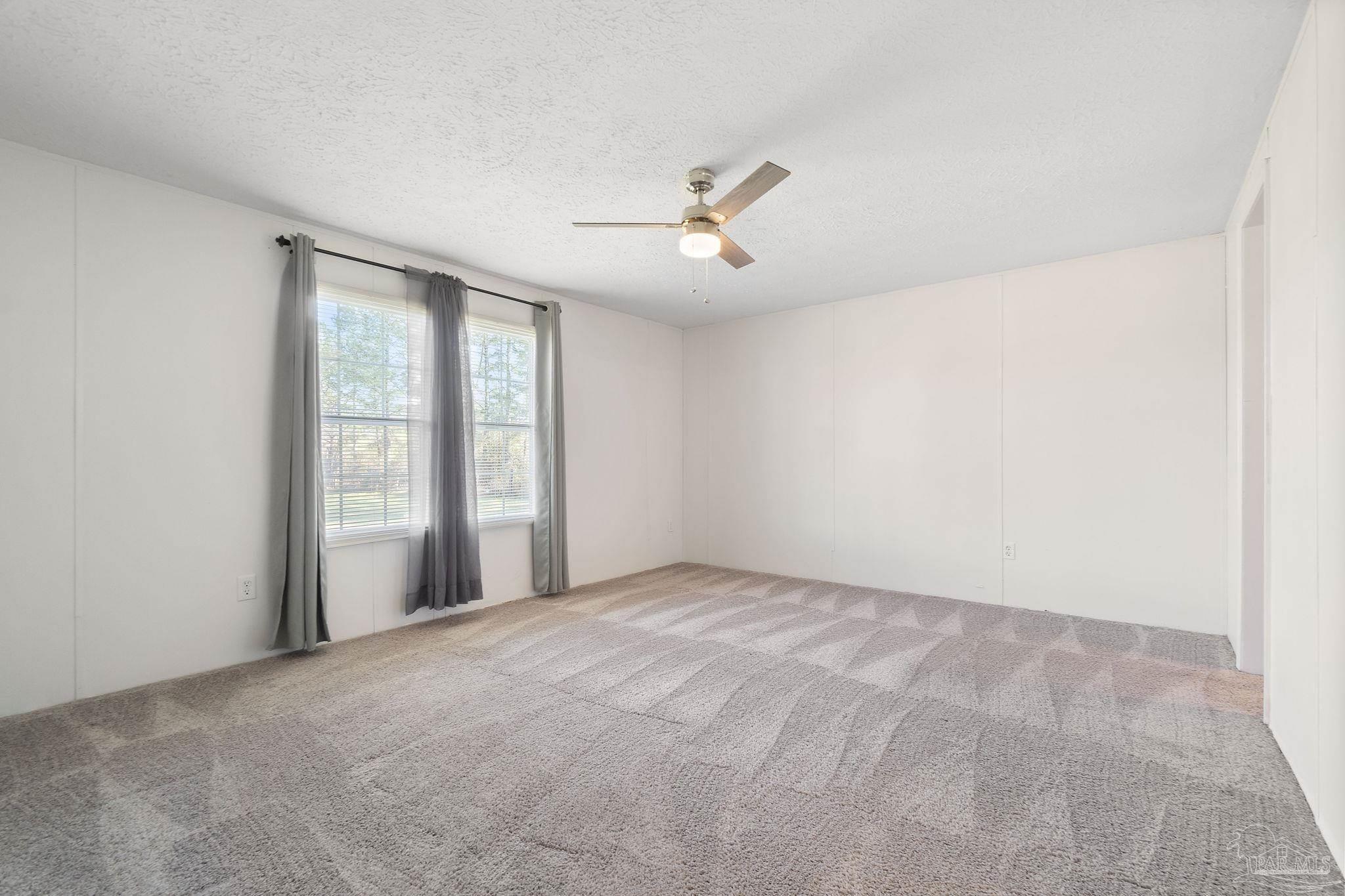 19410 Hunting Club Road Seminole, AL 36574 - Photo 25 of 49 a view of an empty room with a window
