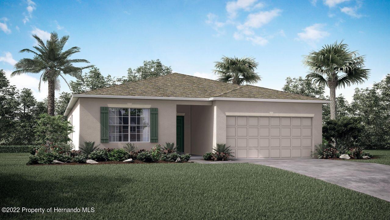 15487 Magdalena Road Weeki Wachee, FL 34614 - Photo 1 of 1 a front view of house with yard and trees around