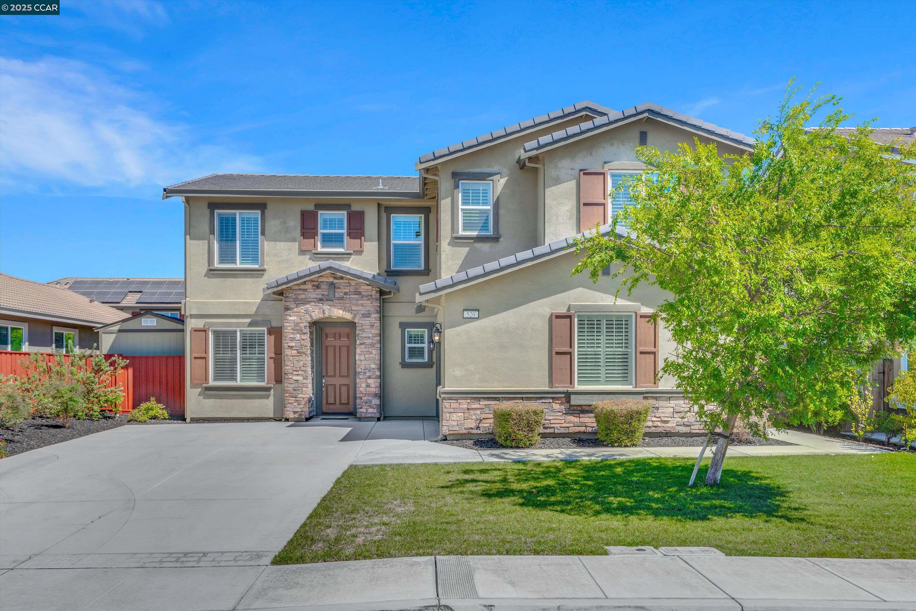 520 Stone Mountain Drive Oakley, CA 94561 - Photo 1 of 1 a front view of a house with a yard