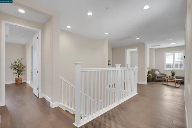 a view of a hallway with workspace
