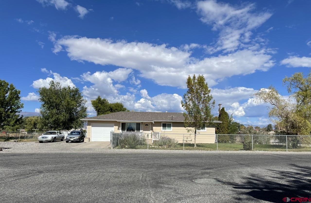 1201 Frontier Road Delta, CO 81416 - Photo 1 of 21 front view of a house with a street