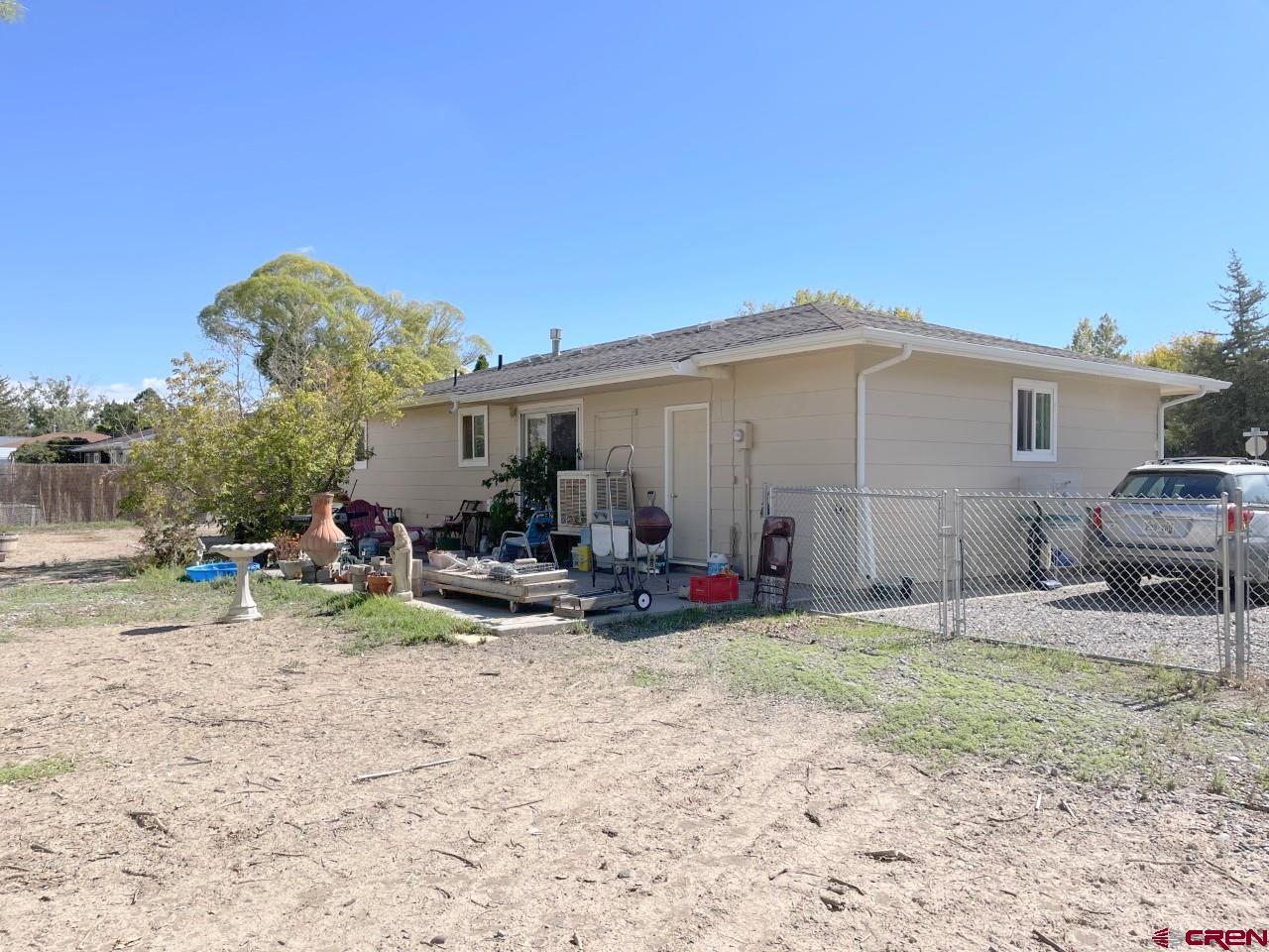 1201 Frontier Road Delta, CO 81416 - Photo 15 of 21 a view of a house with backyard