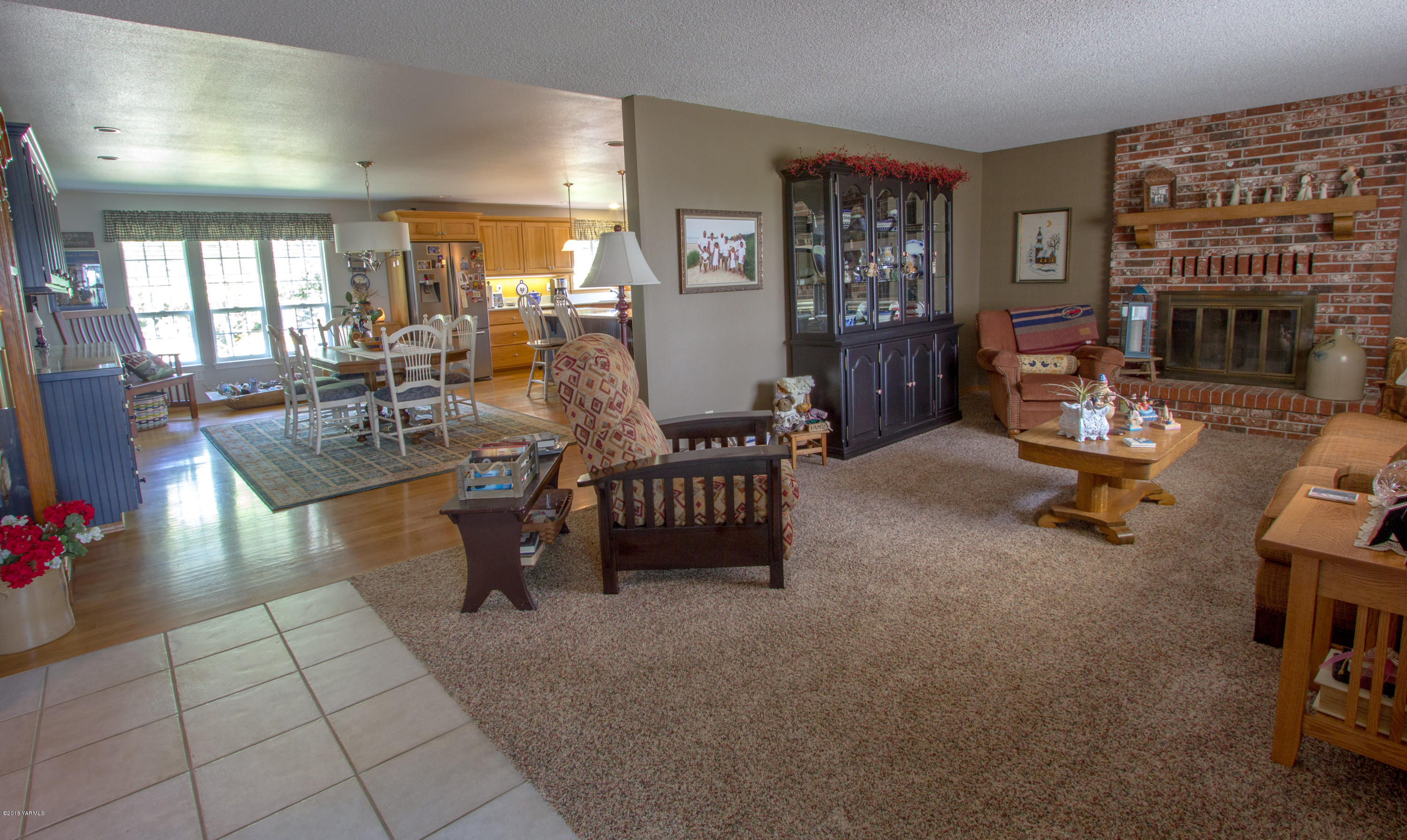 3210 Harrah Road Harrah, WA 98933 - Photo 15 of 33 a view of a livingroom with furniture and a fireplace