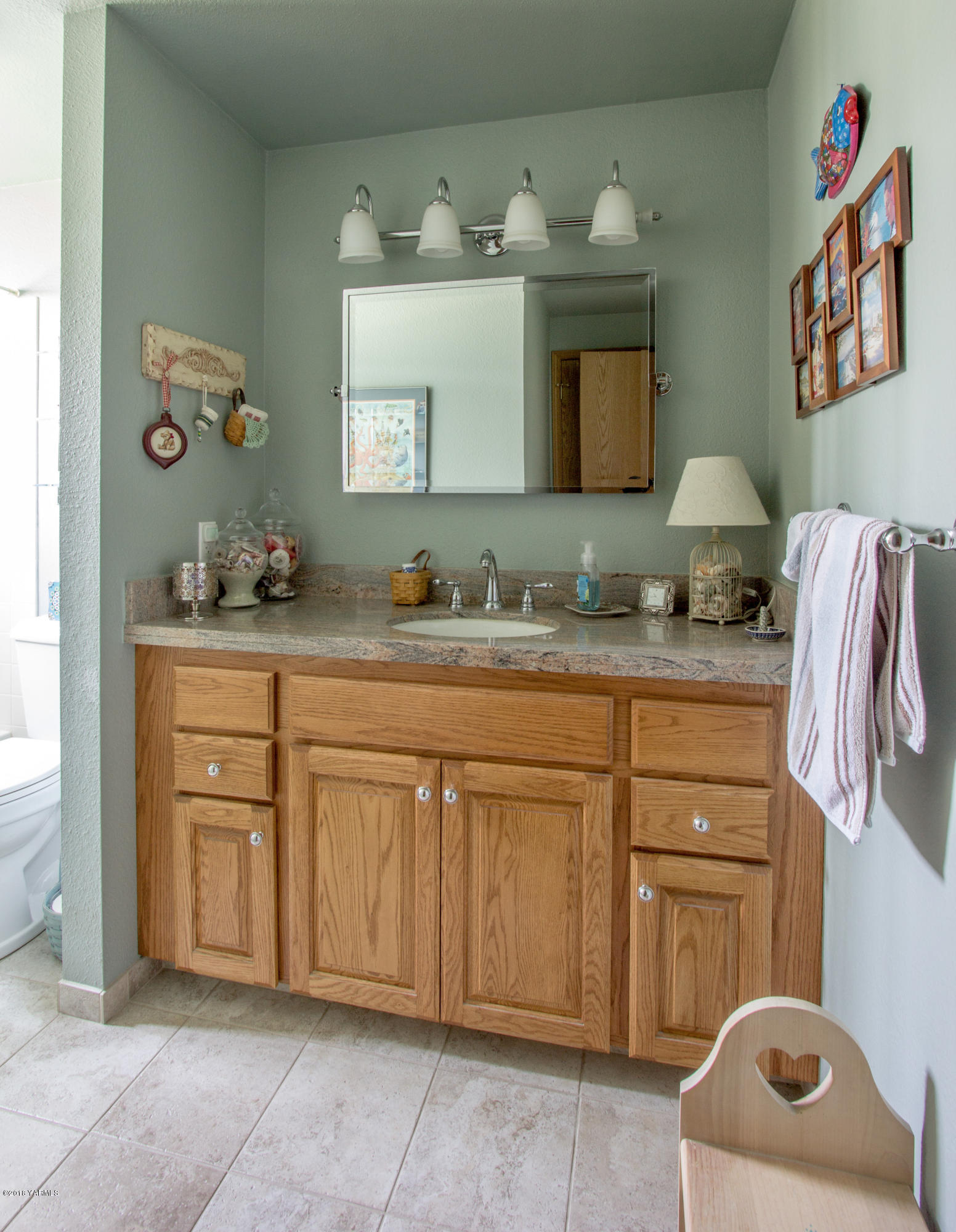 3210 Harrah Road Harrah, WA 98933 - Photo 26 of 33 a bathroom with a sink and a mirror