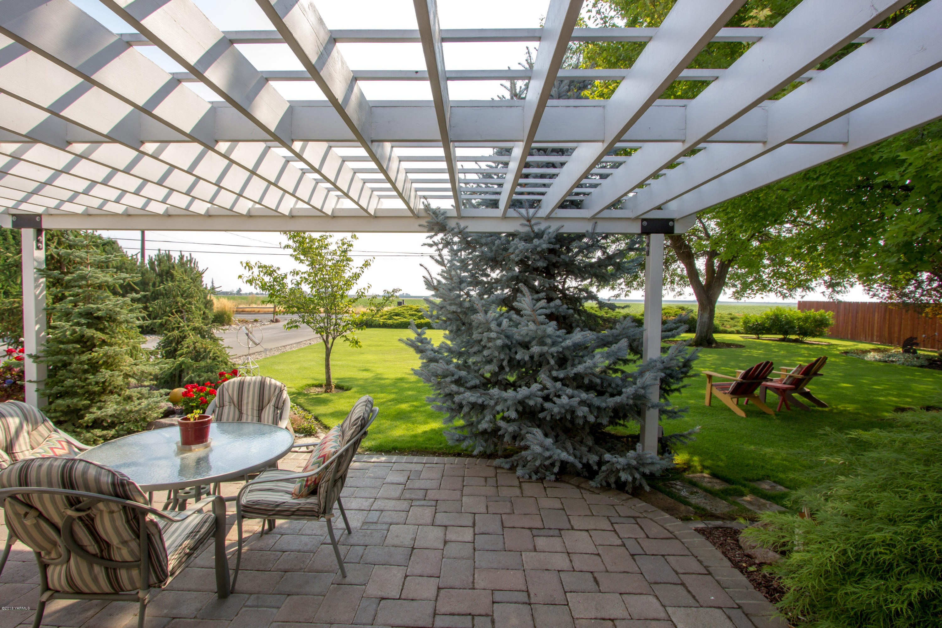 3210 Harrah Road Harrah, WA 98933 - Photo 7 of 33 a roof deck with table and chairs and potted plants