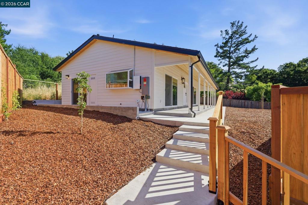 3196 Rohrer Drive Lafayette, CA 94549 - Photo 1 of 30 a front view of a house with a porch