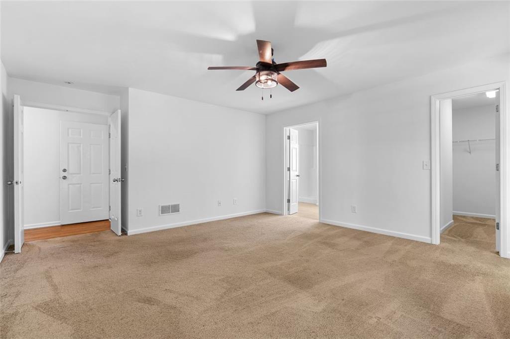 80 Castle Court Ellijay, GA 30540 - Photo 21 of 39 an empty room with closet and windows
