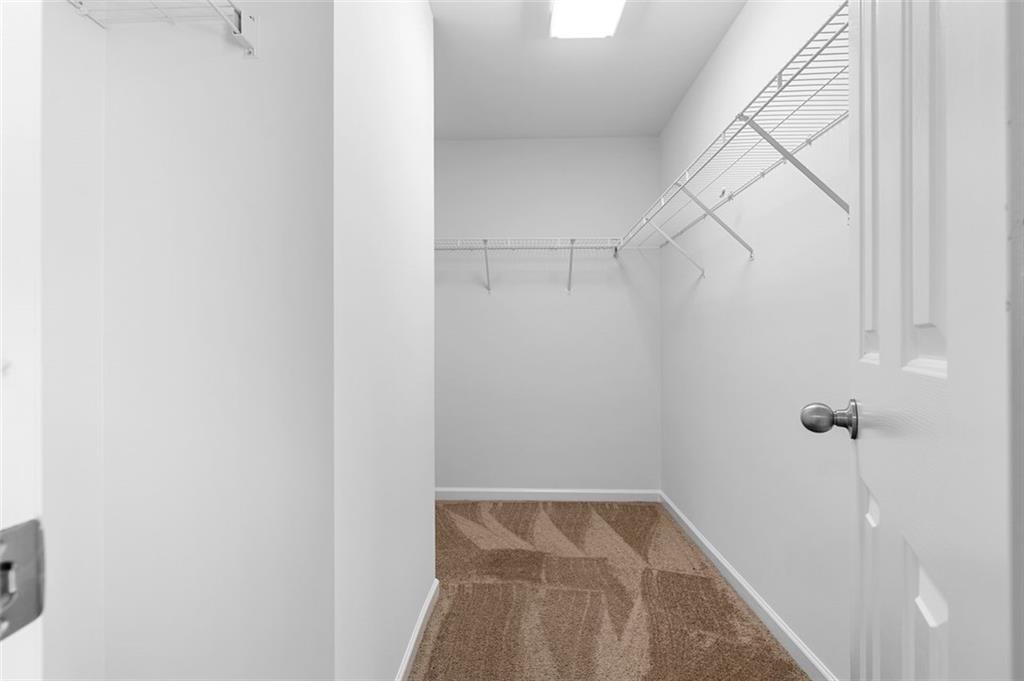 80 Castle Court Ellijay, GA 30540 - Photo 22 of 39 a view of a room with racks on the wall