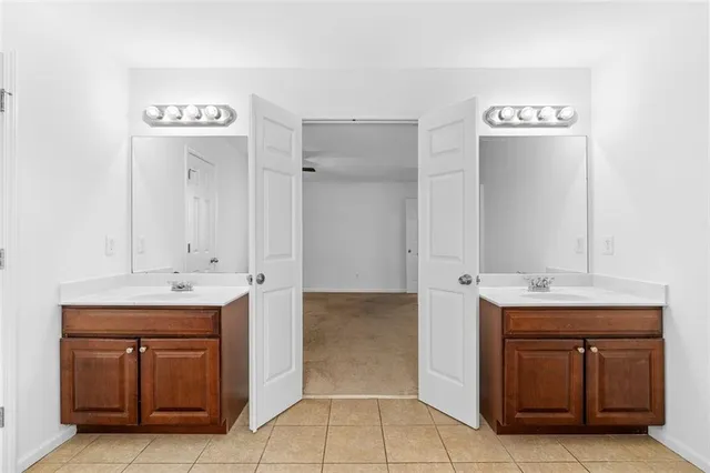 a view of a storage & utility room with refrigerator