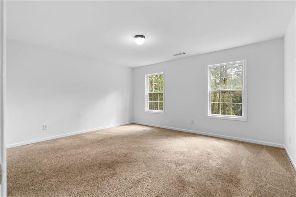 80 Castle Court Ellijay, GA 30540 - Photo 27 of 37 an empty room with windows