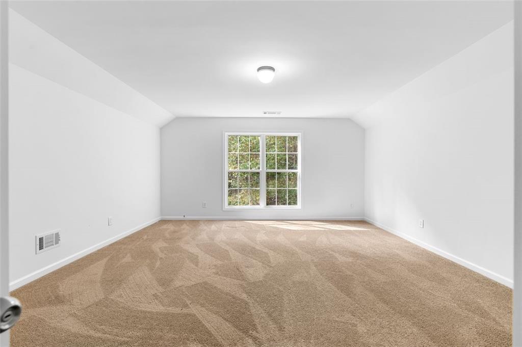 80 Castle Court Ellijay, GA 30540 - Photo 30 of 39 a view of an empty room with a window